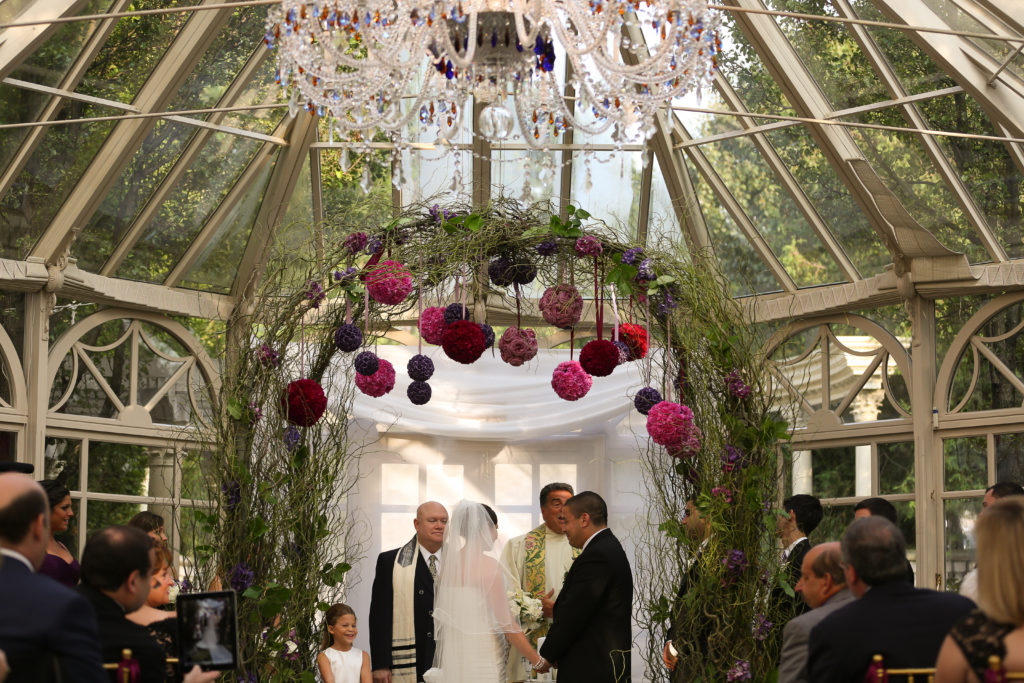 Grand Conservatory set for a wedding ceremony at The Brownstone